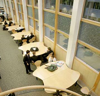 image, Window with desks and students.