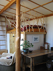 Borton and Welsh designed the inside of the one-room cottage for ultimate efficiency and light.