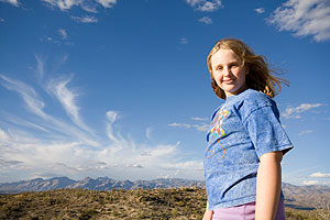 Girl with sky and parkland