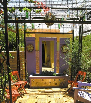 Adobe wall on side/front yard.