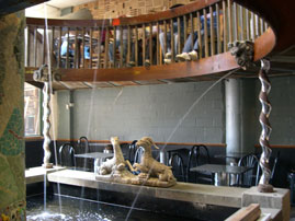 Waterfall, gargoyles, and granite staircase.