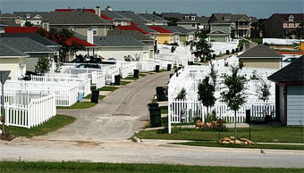 Most garages are accessed off alleys at Plum Creek.