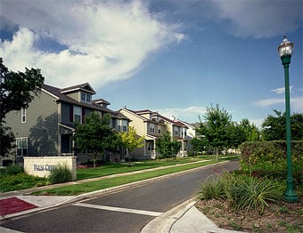 Streets are narrow to meet the New Urban goals of pedestrian-orientation, reduced traffic speed, and multimodal use.