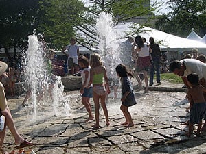 Children playing the in Republic Square fountain during the 2006 Austin Fine Arts Festival.