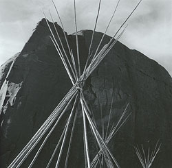 Teepee and mountain.