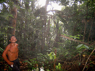 Juan's brother watches for toucans.