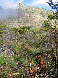Juan's brother waits for his guests to catch their breaths.