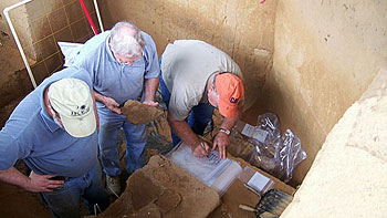 Labeling and bagging individual rocks and artifacts from the 10,000 year-old feature.