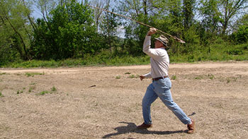 Roger Lindsay throwing a spear with an atlatal as was done for thousands of years.