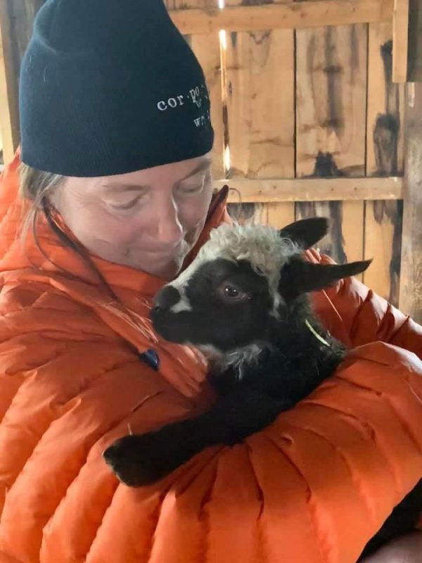 Pam holding newborn lamb
