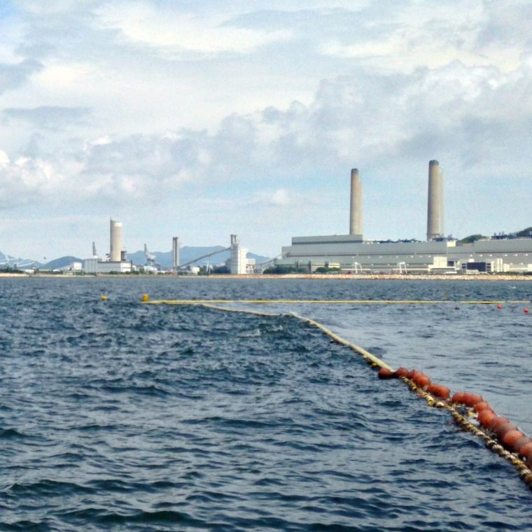 Nets keep all of the sharks and some of the trash away from Hong Kong beaches.