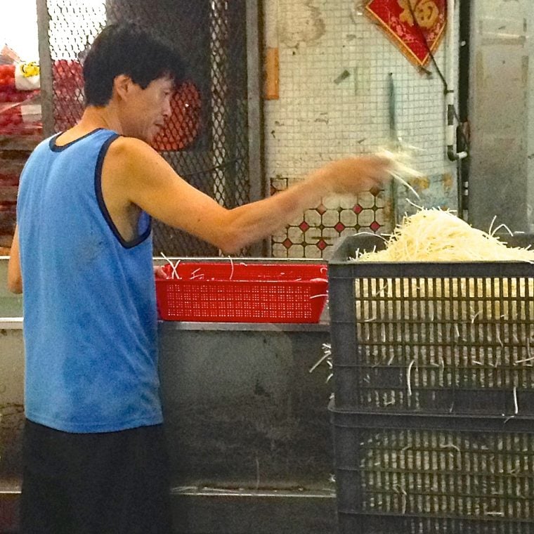 Food repackaging at the wholesale market is labor intensive.