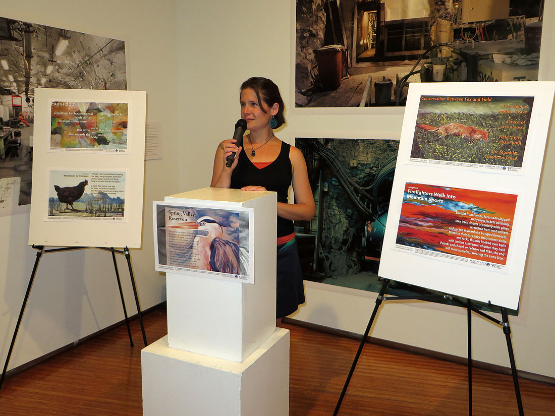 Broadsided editor Alexandra Teague introduces the bus broadsides at a reading held during the ASLE biennial conference.
