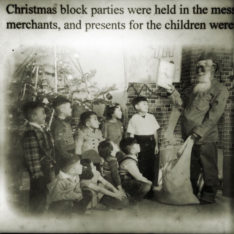 Amache photograph of Japanese children and Santa. Photo by Sarah Skeen.