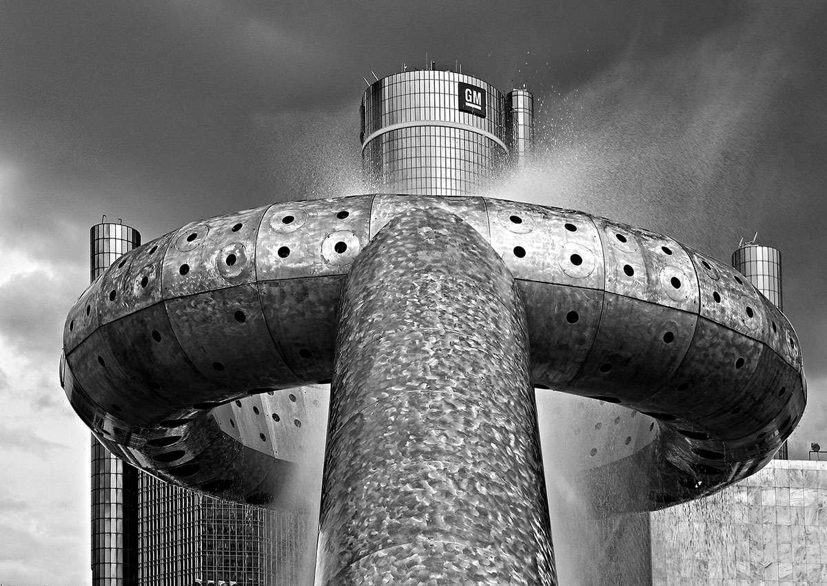 Dodge Fountain designed by Isamu Noguchi in Detroit's Hart Plaza and the top of the Renaissance Center