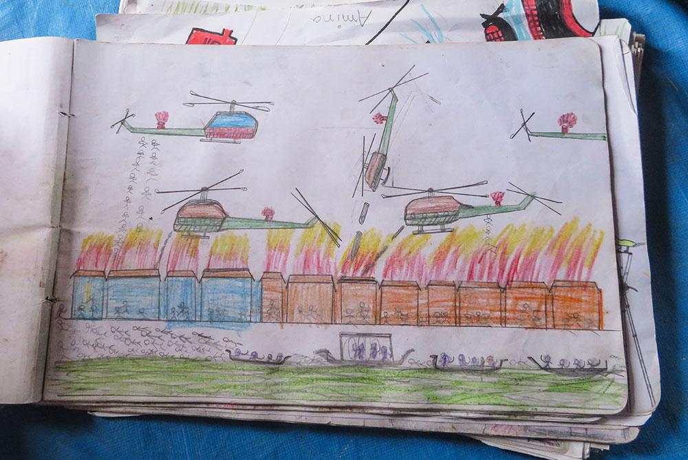 Child's drawing of helicopters attacking Rohingya village in Myanmar