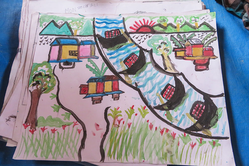 Child's painting of a happy Rohingyan village