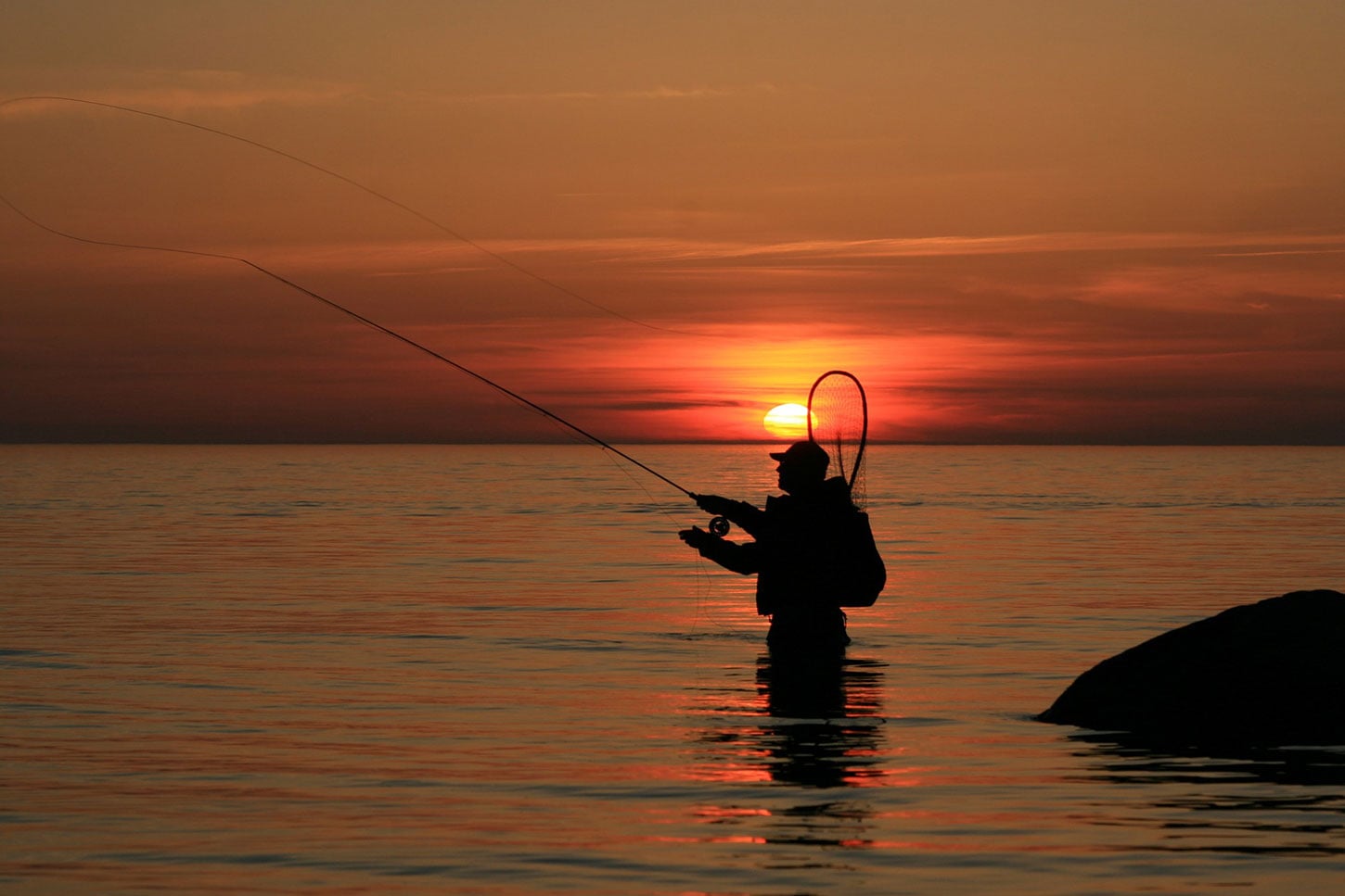 Fly fishing at sunset