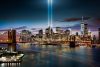New York City skyline with 9/11 Memorial lights at night