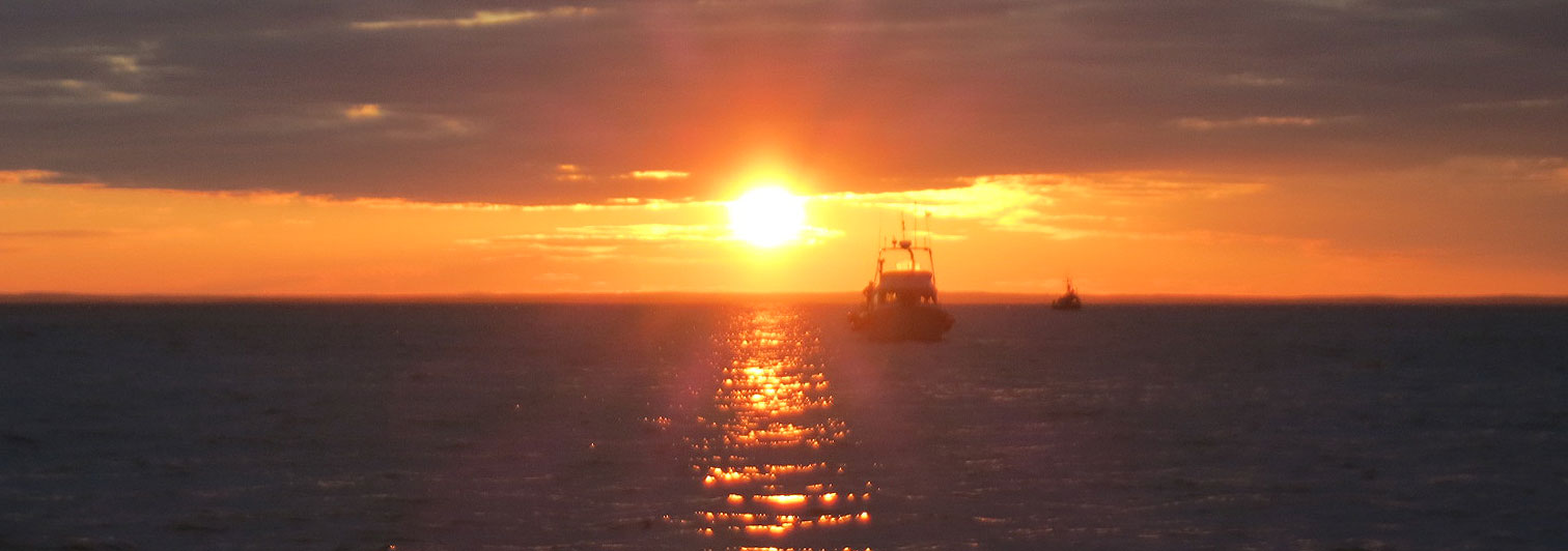 Sunset on Bristol Bay, with fishing boat