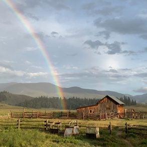 Rainbow ending in the barn on Pam Houston's Colorado ranch