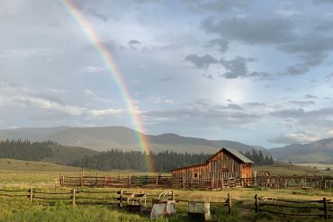 Rainbow ending in the barn on Pam Houston's Colorado ranch