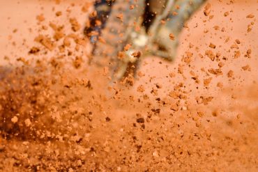 Dirt bike tire and flying mud