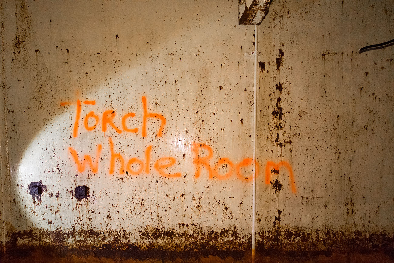 Torch Whole Room spray painted on wall