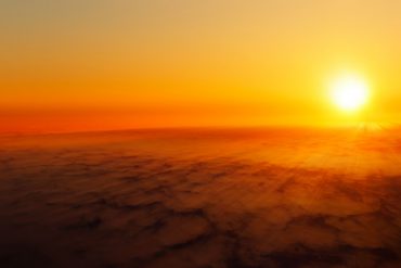 Burning sun on the horizon