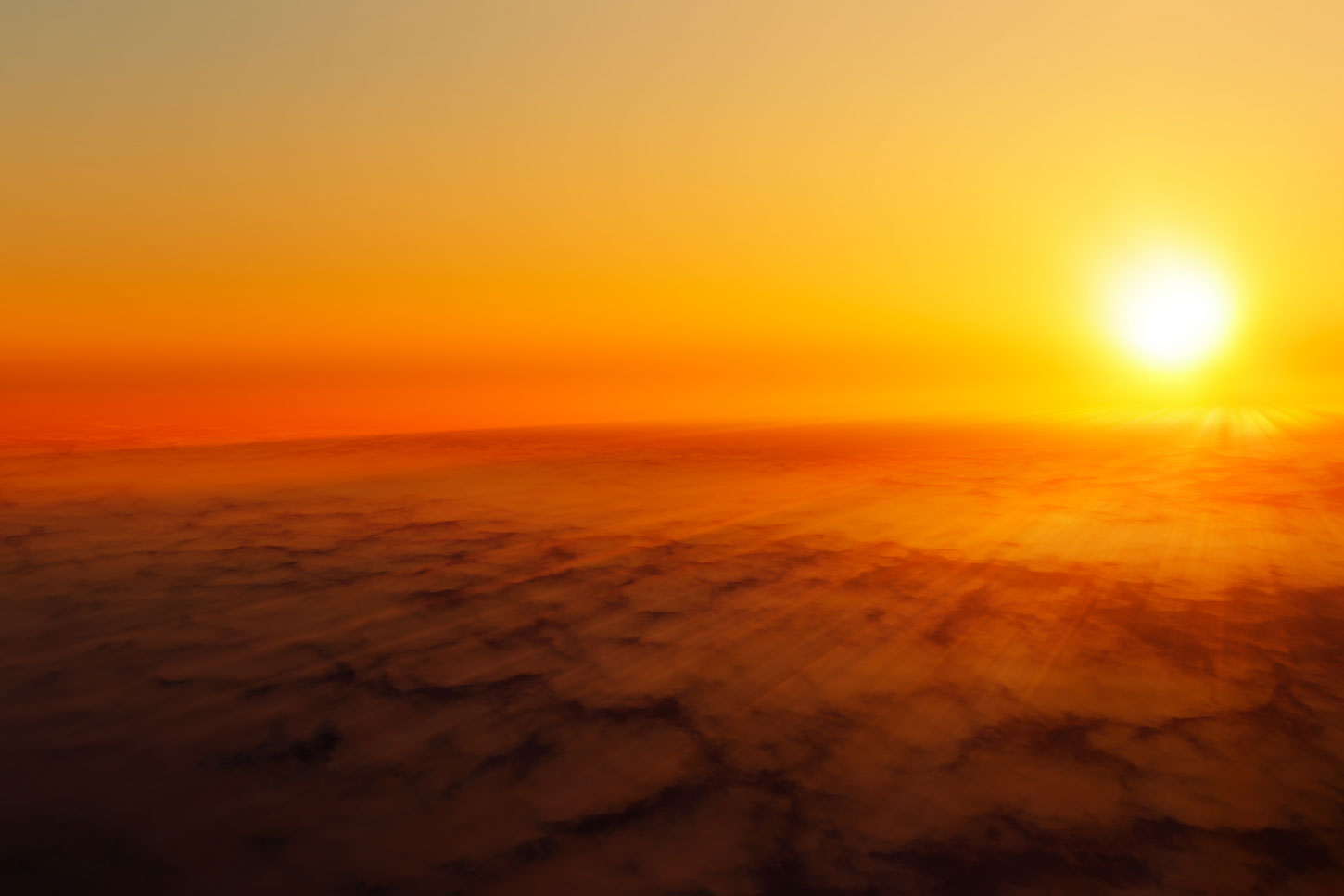 Burning sun on the horizon