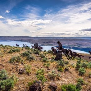Grandfather Cuts Loose the Ponies sculpture and landscape