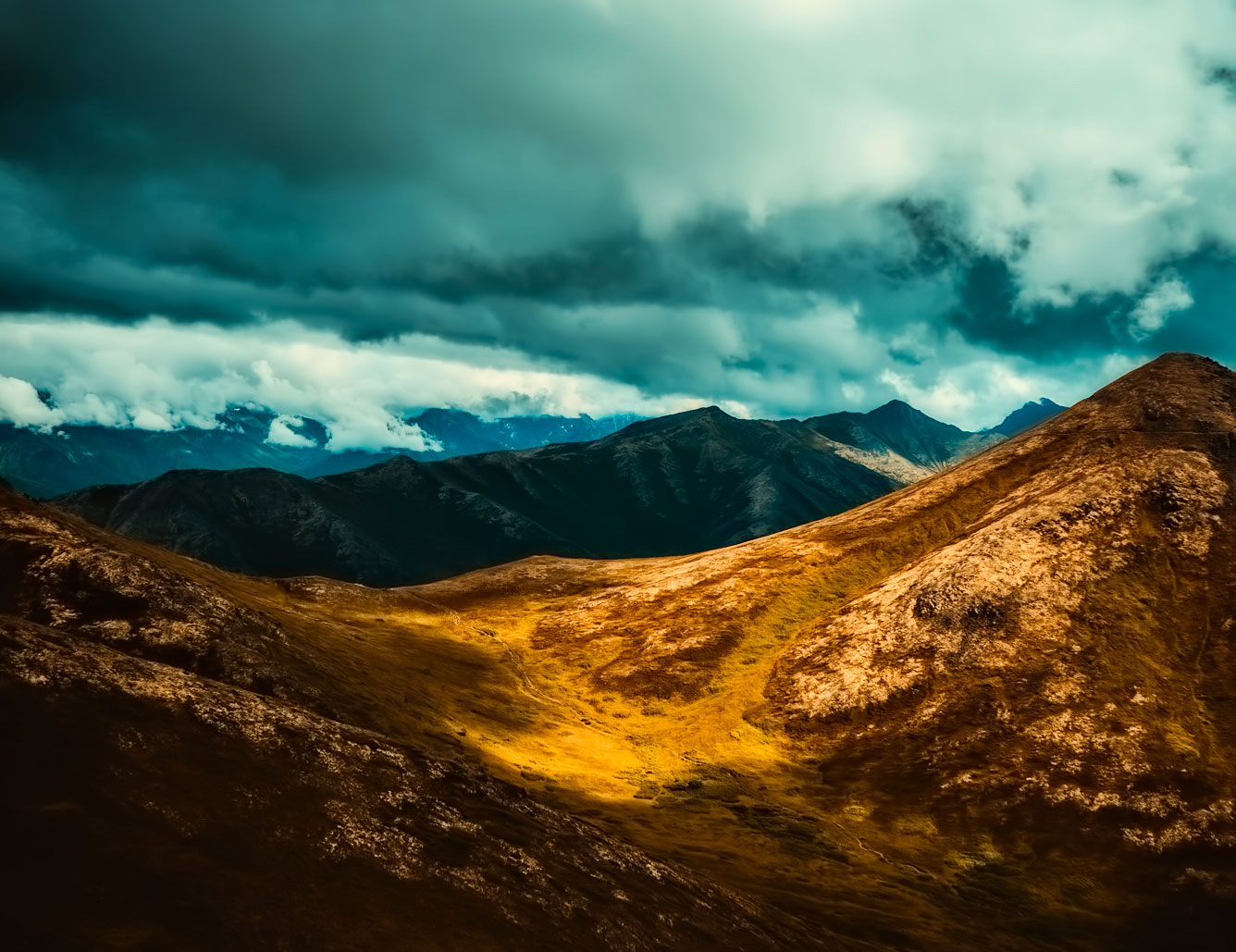 Dark clouds over Alaska mountains
