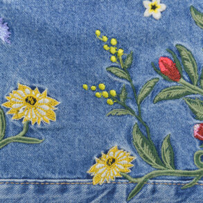 Flowers embroidered onto denim