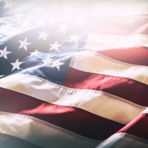 American flag with sunlight