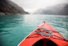 Kayak's view on the water in coastal Alaska