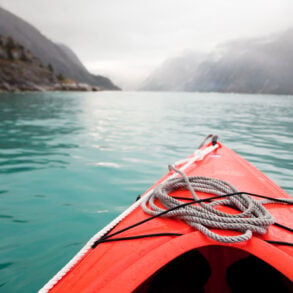 Kayak's view on the water in coastal Alaska
