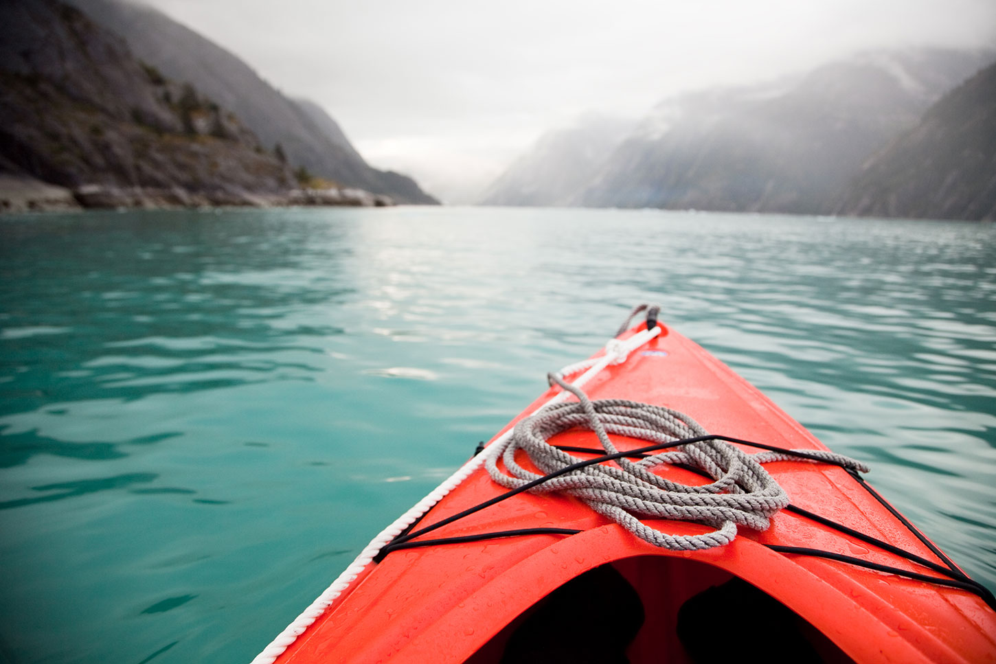 Kayak's view on the water in coastal Alaska