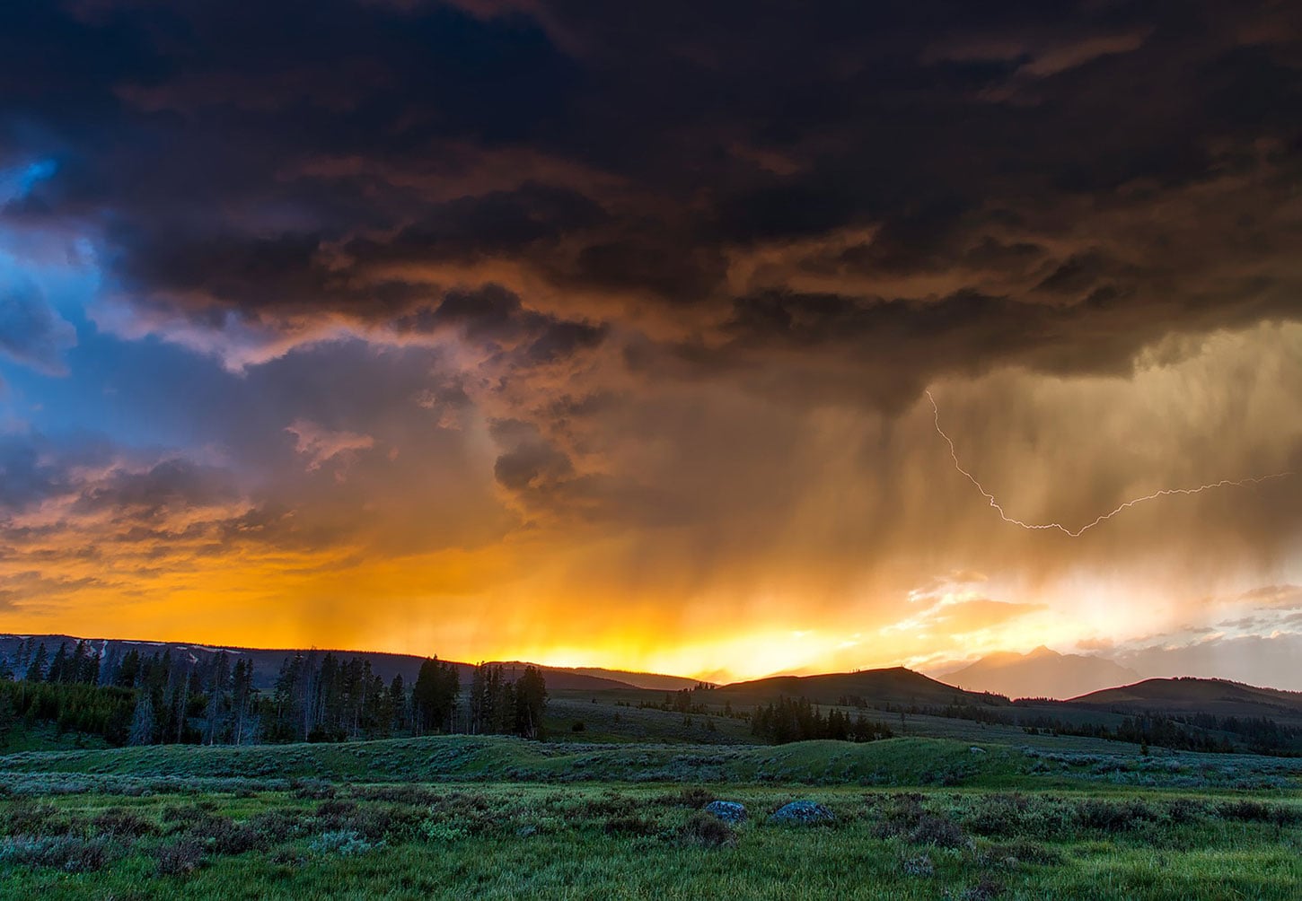 Sunset storm over mountains
