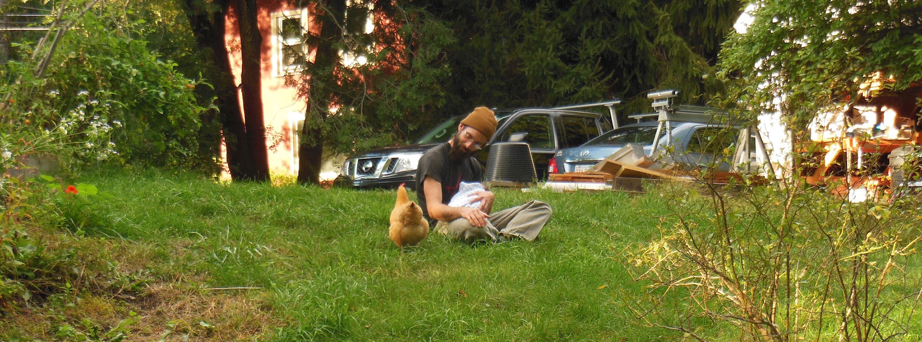 Father, daughter, and chicken