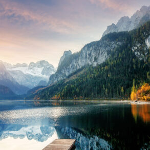 Sunrise over alpine lake in autumn