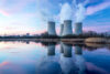 Nuclear plant on edge of water at twilight