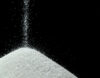Salt falling into pile