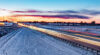 Interstate at sunset with snow