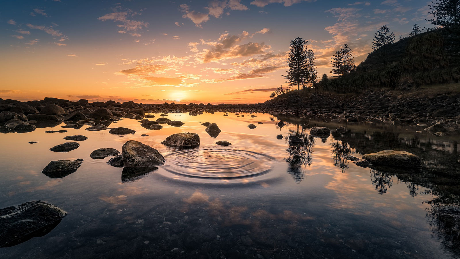 Lake with ripples at sunset