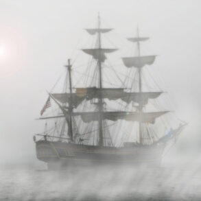 Old sailing ship in fog