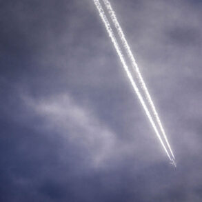 Airplane with contrail