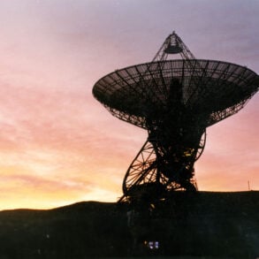 Radio dish at sunset
