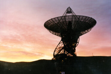 Radio dish at sunset