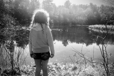 Daughter watching geese