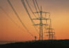 Transmission lines at sunset